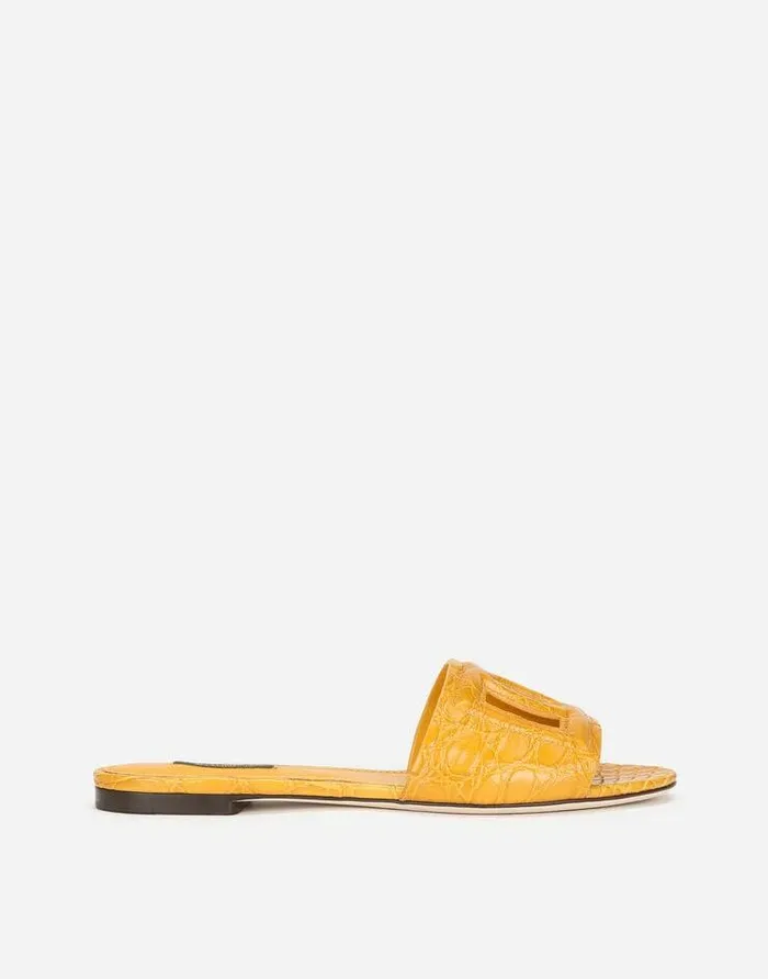 Dolce and Gabbana Slides And Mules Women Fianchi Cocco Crocodile Skin Slides With The DG Millenials Logo Orange Dolce and Gabbana Slides And Mules Women Fianchi Cocco Crocodile Skin Slides With The DG Millenials Logo Orange
