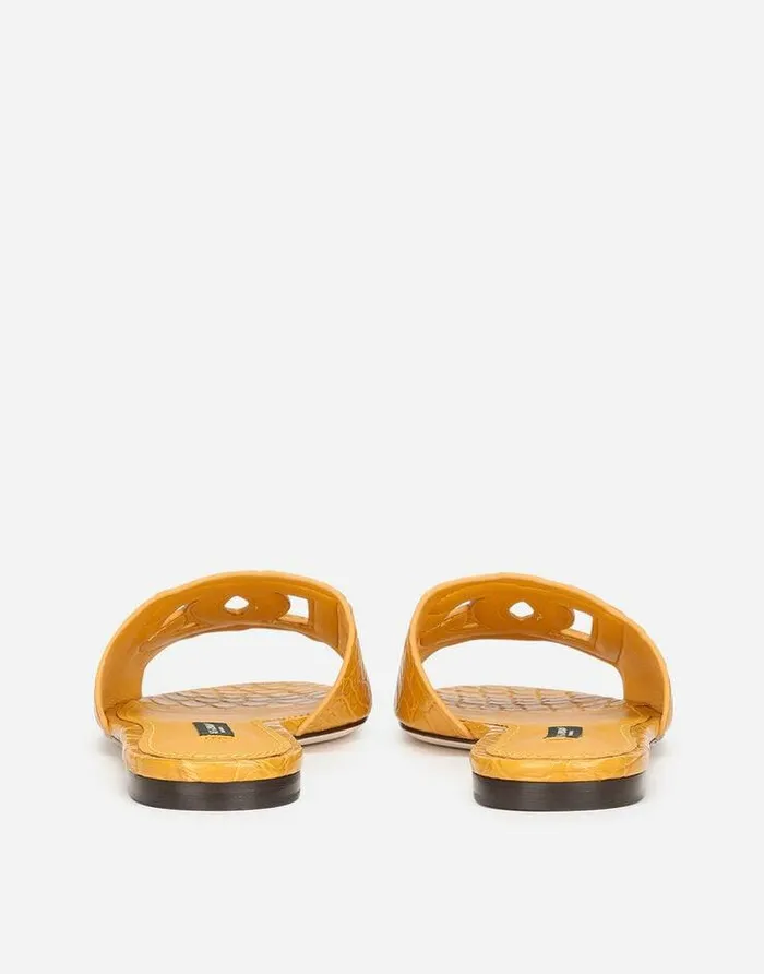 Dolce and Gabbana Slides And Mules Women Fianchi Cocco Crocodile Skin Slides With The DG Millenials Logo Orange Dolce and Gabbana Slides And Mules Women Fianchi Cocco Crocodile Skin Slides With The DG Millenials Logo Orange