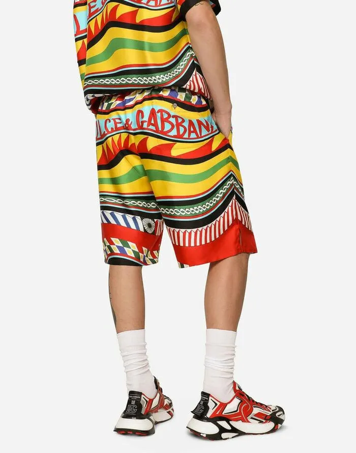 Dolce and Gabbana Trousers And Shorts Men Silk Twill Jogging Shorts With Carretto Print Multicolor Dolce and Gabbana Trousers And Shorts Men Silk Twill Jogging Shorts With Carretto Print Multicolor