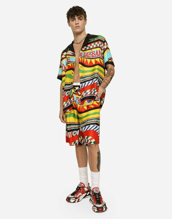 Dolce and Gabbana Trousers And Shorts Men Silk Twill Jogging Shorts With Carretto Print Multicolor Dolce and Gabbana Trousers And Shorts Men Silk Twill Jogging Shorts With Carretto Print Multicolor